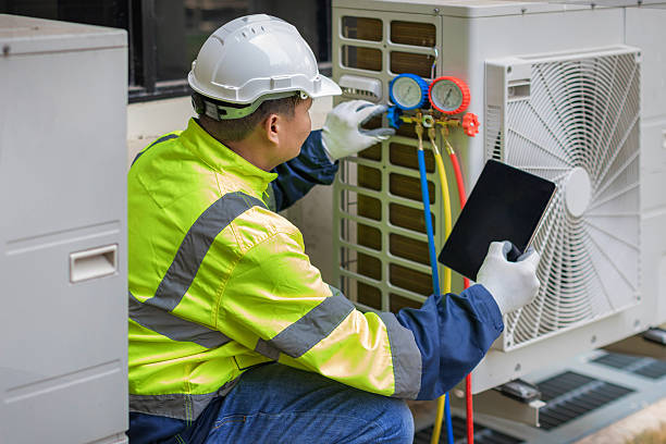 Professional Heat Pump Repair technician working in Olney, TX